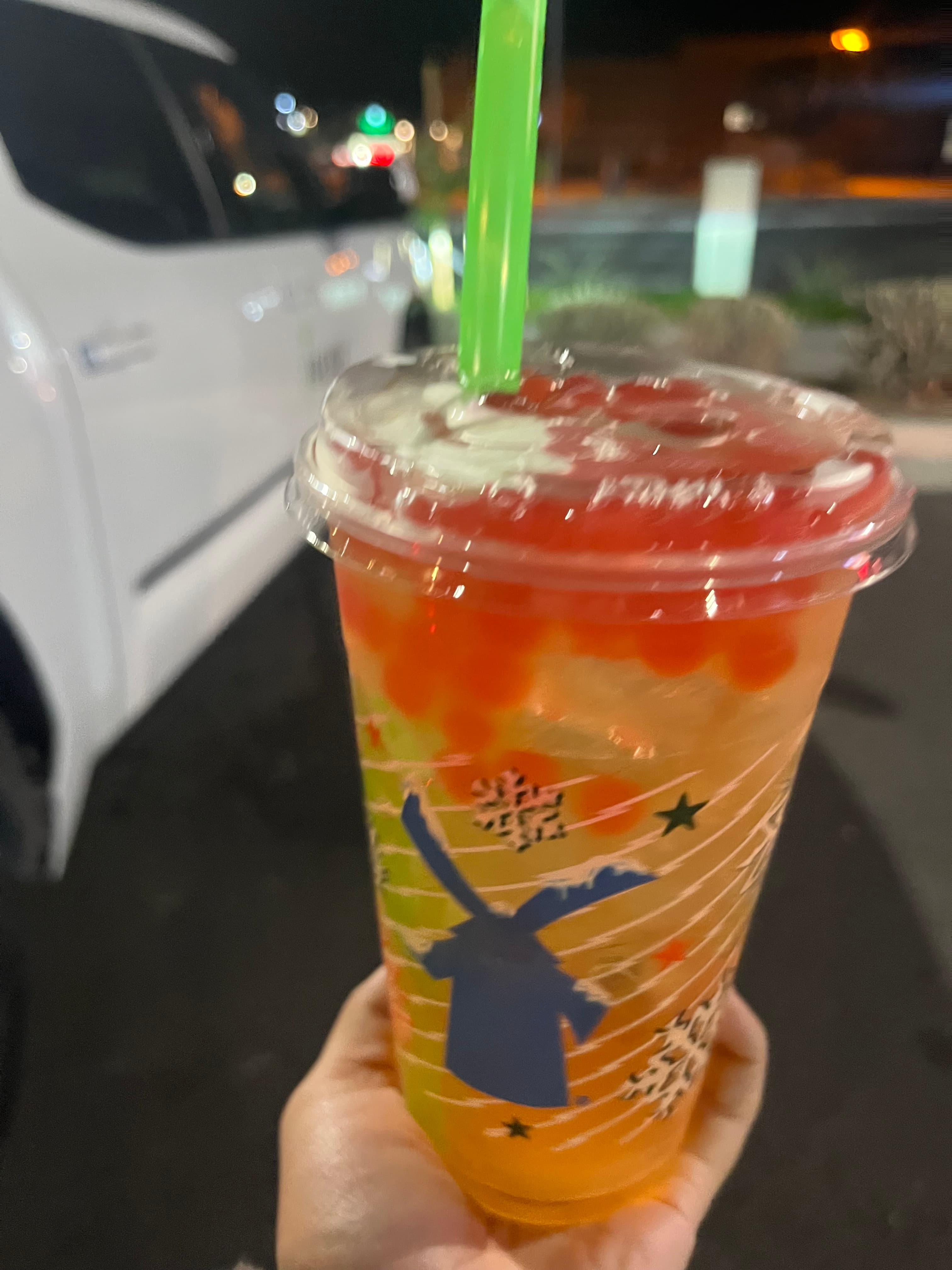 Mango And Peach Green Tea With Raspberry Popping Bobba